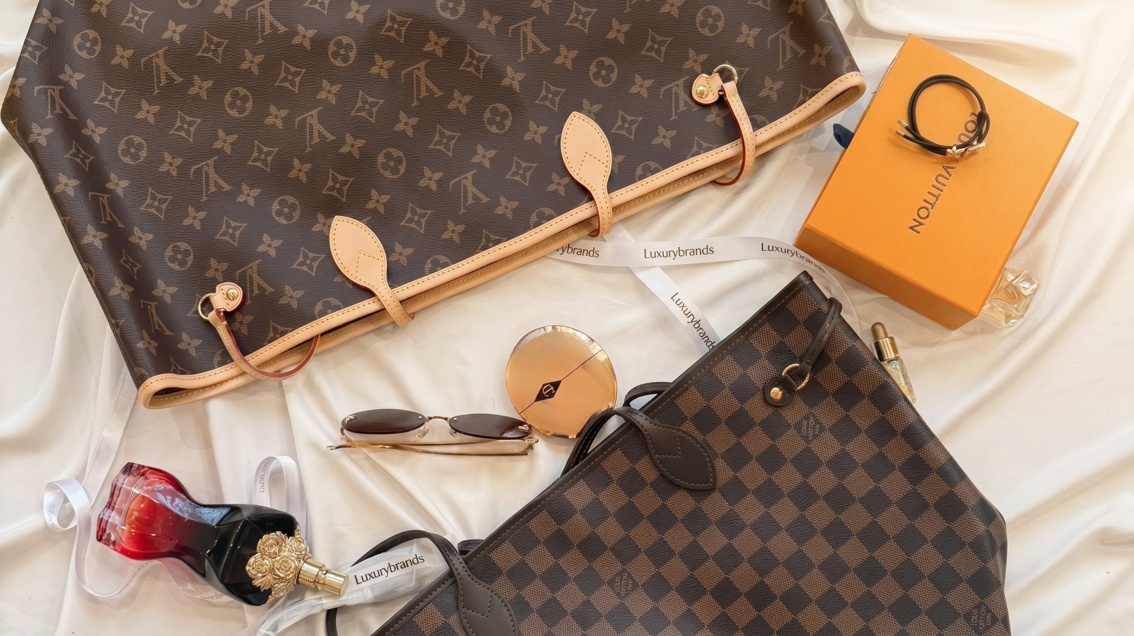 Designer gifts for her Egypt — bags, jewellery, scarves and small leather goods