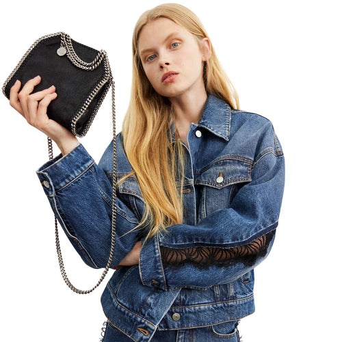 Falabella Tiny in black silver – styled view
