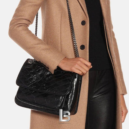 Saint Laurent niki medium in vintage leather