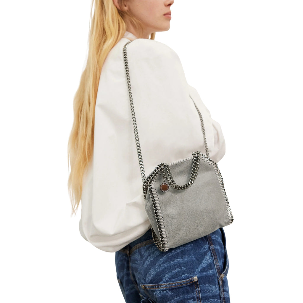Stella McCartney Falabella Tiny in light grey – styled view
